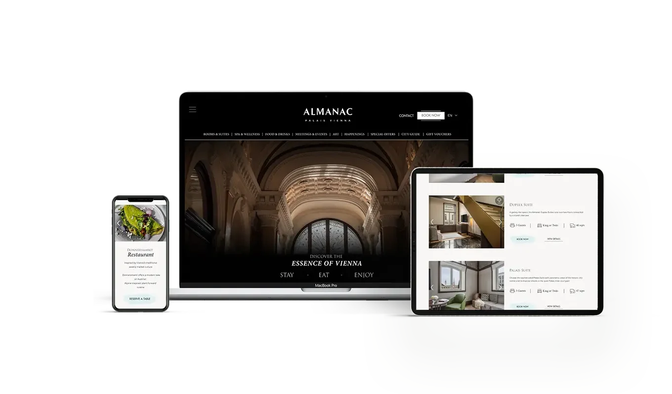A smartphone, laptop, and tablet display the Almanac Vienna hotel website, showing a menu, the homepage with an arched hallway, and a booking page with room images.